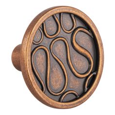 an image of a door knob that is made out of wood and has wavy designs on it