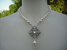 Hey, I found this really awesome Etsy listing at https://www.etsy.com/listing/99967024/ava-collection-art-deco-rhinestone-and Silver Pearl Necklace With Intricate Design For Wedding, Ornate Pendant Bridal Necklace For Wedding, Ornate Bridal Pendant Necklace For Wedding, Ornate Crystal Necklace For Wedding, Ornate Crystal Wedding Necklace, Vintage Pearl Necklace With Crystal For Wedding, Vintage Crystal Pearl Necklace For Wedding, Vintage Silver Bridal Necklace With Pearl Drop, Vintage Pearl Pendant Necklace For Wedding