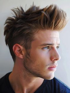 Introduction The faux hawk hairstyle offers a perfect blend of edge and stylemaking it a popular choice among men who want to add a dash of rebellion to their look without fully committing to a radi Hawk Hairstyle, Modern Workplace, Curly Short, Boys With Curly Hair, Oval Face Shapes