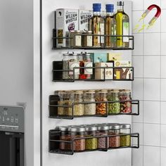 a stainless steel refrigerator with spice and condiments on it