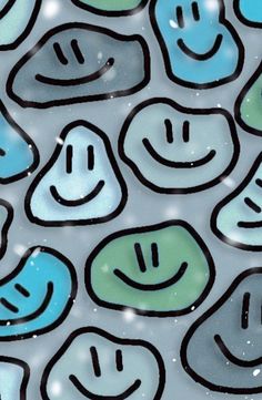 an image of many smiley faces on a glass surface