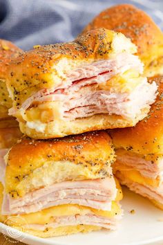 ham and cheese bagels stacked on top of each other