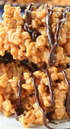 some kind of cereal bar with chocolate drizzled on top