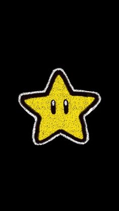 a yellow star with eyes drawn on it