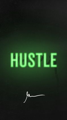 the words hustle are lit up in green