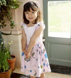 So sweet 💗  Little Miss M looking gorgeous in the Vanessa dress from our new "Cherish" collection.  So ready for spring 💐  It’s still cold and rainy in San Francisco! Playful Flutter Sleeve Spring Dress, Playful Spring Dress With Flutter Sleeves, Playful Floral Print Dress With Flutter Sleeves, Playful Floral Print Dress With Ruffle Sleeves, Playful Ruffle Sleeve Dress With Floral Print, Playful Ruffle Sleeve Twirl Dress For Summer, Playful Summer Twirl Dress With Ruffle Sleeves, Playful Twirl Dress With Ruffle Sleeves For Summer, Playful Floral Print Dress For Garden Party