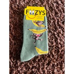 Add A Splash Of Fun And Quirkiness To Your Wardrobe With These Foozys Monkey & Banana Print Socks. Ideal For Light-Hearted Fashion Enthusiasts. Cute Monkey And Banana Design Comfortable Fit Soft And Durable Material Elasticated Cuffs S/M Size Suitable For Daily Wear Lightweight And Breathable Size 3-10 Banana Design, Monkey Banana, Monkey And Banana, Banana Print, Print Socks, Cute Monkey, Hosiery, New Color, Daily Wear