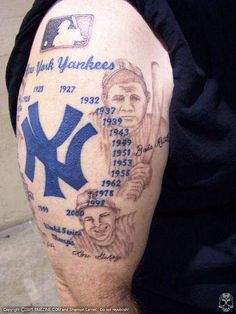 a man with a tattoo on his arm that has a baseball player's name and number