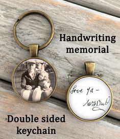 two personalized keychains with handwriting on them, one is holding a child