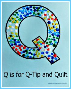 the letter q is for q - tip and quilt with colorful dots on blue background