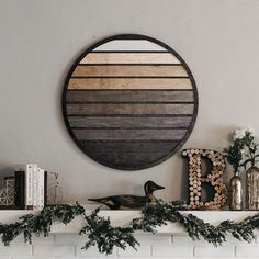 a fireplace mantel topped with a wooden circle