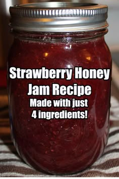 a jar filled with jam sitting on top of a table