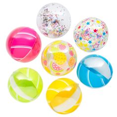 six plastic balls with different designs and colors are shown in the image on a white background