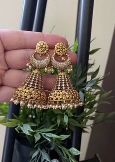 Height = 58 mm || Width = 32 mm Bollywood Look Antique Earring Gorgeous designer zircon two tone earrings, light weight Highest quality and craftsmanship, Ready to ship from NJ USA Please contact us for any questions Heavy White Fusion Style Jhumkas, Dual-tone Round Temple Jewelry Jhumkas, Dual-tone Temple Jewelry Jhumkas, Dual-tone Chandbali Jhumkas For Wedding, White Chandbali Jhumkas For Anniversary, Fusion Style Jhumkas For Anniversary And Festivals, Fusion Style Dual-tone Chandbalis For Wedding, Dual-tone Round Jhumkas For Festivals, Dual-tone Round Jhumkas For Diwali