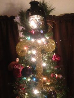 a christmas tree with lights and ornaments on it