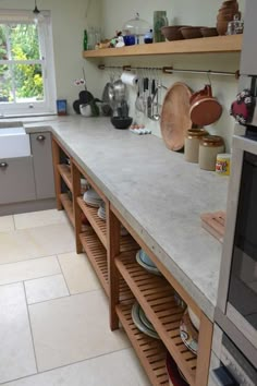 a kitchen with an oven, microwave and counter top