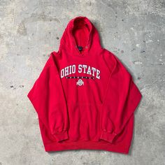 "Vintage Red Ohio State Hooded Sweatshirt. Used condition. Size L Pit to Pit: 26\" length from collar: 25\"" Red Varsity Hoodie For Streetwear, Vintage Red Hoodie For Streetwear, Red Fan Apparel Hoodie, Red Sweatshirt With Adjustable Hood For Streetwear, Red Collegiate Sweatshirt With Ribbed Cuffs, Collegiate Red Hoodie, Collegiate Red Hoodie For Fan Gear, Red Collegiate Hoodie For Fan Gear, University Red Collegiate Long Sleeve Hoodie