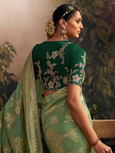 This Pista Green color silk saree has lighter shades and it always work wonders for women who want to look slender. This saree comes with zari work all over the attire with creative design and tassels look chic and ideal. This saree comes with unstitched Dark Green color silk blouse. This product consists of ready stitched blouse. Designs, colors and patterns on the actual product may slightly vary from designs shown in the image. Images are only representative. Pista Green Saree Contrast Blouse, Green Saree Contrast Blouse, Pista Green Saree, Saree Contrast Blouse, Saree With Contrast Blouse, Wedding Sarees Online, Pista Green, Sea Green Color, Designer Saree Blouse Patterns