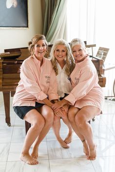 "This set of 8 monogram bridesmaid shirts make a beautiful and practical gift for your bridal party! Oversized and perfect for getting ready, no mussed up hair or make-up, and you'll have gorgeous wedding party pictures that last a lifetime! After the big day, they can be worn with leggings, as a nightshirt or swim suit cover-up. **If you need a different quantity of shirts, please visit my ETSY store here: www.etsy.com/shop/ELRILEYGIFTS PLEASE BE SURE TO INCLUDE THE FOLLOWING INFORMATION. MISSI Wedding Parties Pictures, Flower Girl Shirts, Bridal Party Getting Ready, Bridal Parties Pictures, Monogram Shirt, Wedding Party Shirts, Wedding Hairstyles Bride, Bridesmaid Getting Ready, Monogram Shirts