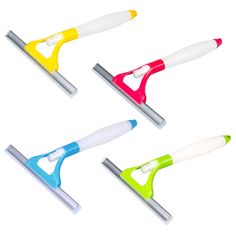 four different colored plastic toothbrushes on white background