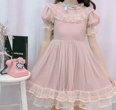 Feel like a cute princess in this Kawaii Ruffle Tulle Princess Dress! Size Chart: Size Bust (cm) Waist (cm) Shoulder (cm) Length (cm) Bust (in) Waist (in) Shoulder (in) Length (in) S 83 76 33 85 32.68 29.92 12.99 33.46 M 88 80 35 87 34.65 31.50 13.78 34.25 L 93 84 37 89 36.61 33.07 14.57 35.04 Description: Waistline: EmpireSleeve Style: Puff SleeveSleeve Length(cm): ShortSilhouette: A-LinePattern Type: SolidOrigin: CN(Origin)Neckline: O-NeckMaterial Composition: Synthetic FiberMaterial: Lace/Mes