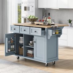 a kitchen island with two drawers and an open shelf