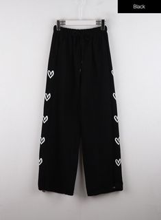 mid-waist-side-heart-parachute-jogger-lounge-pants-id313 / Black Black Drawstring Sweatpants For Summer, Black Leisure Trousers, Baggy Black Bottoms With Graphic Print, Black Baggy Bottoms With Drawstring, Black Drawstring Leisure Pants, Black Wide Leg Leisure Bottoms, Black Drawstring Wide-leg Pants, Black Wide-leg Drawstring Bottoms, Black Wide-leg Pants With Drawstring