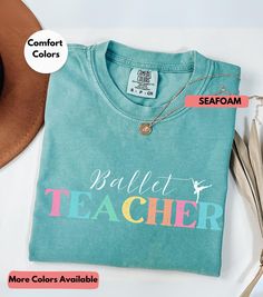 Are you looking for dance teacher gift? We got you! ✅ ABOUT OUR Dance teacher T shirt  Comfort Color T-shirt  ▸ 100% ring-spun US cotton for long-lasting comfort.  ▸  The garment is sewn around the finished edges with double stitching, making it long-lasting ▸  The garment is dyed after it's been constructed, giving it a soft color and texture ▸ Printed and shipped from the USA ✅ HOW TO ORDER your Personalized Ballet Teacher Shirt 1. Check our photos for sizing and color options. 📏 2. Choose yo Cotton T-shirt For Back To School Gift, Cotton T-shirt As Back To School Gift, Cotton T-shirt For School Gift, Ballet Teacher, Dance Teacher Gifts, Photo Care, Dance Teacher, Teacher Appreciation Gift, Comfort Color