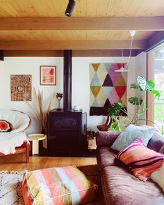 a living room filled with furniture and a fire place