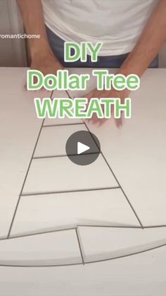 a video demonstrating how to make a diy dollar tree wreath