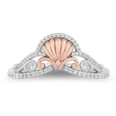 This captivating sterling silver and 10K rose gold Ariel ring is designed to make a statement. This accessory is adorned with 57 round single cut diamonds, each meticulously set to create a luminous display that mirrors the enchanting allure of Ariel herself. Imbued with whimsical charm yet brimming with sophistication, this ring invites you to dive into a world of elegance and luxury, offering a piece of the magic we all hold dear.Our Enchanted Disney fine jewelry collection is charming, romantic and full of whimsy. Helzberg and Disney invite anyone to embrace their inner princess or celebrate a fairytale love story. | 1/7 ct. tw. Ariel Diamond Shell Ring | Sterling Silver and 10K Rose Gold | White | Size 6 | Enchanted Disney London Blue Topaz Engagement Rings, Diamond Crown Ring, Enchanted Disney, Enchanted Disney Fine Jewelry, Tiara Ring, Diamond Tiara, Helzberg Diamonds, Morganite Diamond, Gem Diamonds