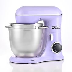 a purple kitchen mixer sitting on top of a white table