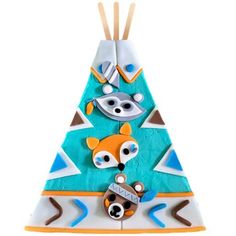 an ornament shaped like a triangle with animals on it