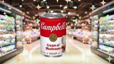 a can of campbell's cream of mushroom soup in a supermarket aisle with stars