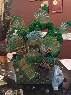 a table topped with lots of green items