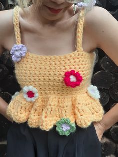 "This is an advanced beginner friendly crochet pattern for \"Buttercup top\" by Amblings. I am a size Small, so the pattern here is made to fit my body type. I used 8mm and 6.5 mm hooks with approximately 200 grams of 4 ply chunky wool yarn and also 2 ply acrylic yarns for flowers . This is a step by step instructions of the pattern in a digital file. If you have any queries regarding the pattern after you have received it, you can always leave a message on my shop message box or DM me on my Instagram page @amblings_ Remember this is a digital file. My shop do not sell or ship any physical product. There will be no returns, exchanges or refunds once the product/item/file is sold, as mentioned in the Etsy policy. Thank you so much for stopping by. Happy shopping!" Crochet Top Chunky Yarn, Crochet Ideas With Yellow Yarn, Advanced Crochet Patterns, Flower Top Crochet, Chunky Yarn Crochet, Diy Crochet Top, Beginner Friendly Crochet, Top Crochet Pattern, Crochet Pattern Instructions