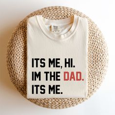 Its Me Hi I'm The Dad Its Me Shirt, Daddy Is The Best Supporter For Me, Dad Life Achievement T-Shirt, New Daddy Announcement Shirt, Dad Love. Welcome to GUERILLA GRAPHICS,  Where creativity meets style in the form of printed apparel! Step into our world of edgy designs and bold statements with our curated collection of t-shirts, sweatshirts, and hoodies. Each garment is a canvas for self-expression, featuring eye-catching graphics that make a statement and stand out from the crowd. From urban-in Funny Screen Print Tops For Father's Day, Funny Screen Print Top For Father's Day, Funny Father's Day Tops With Screen Print, Funny Print Cotton Top For Father's Day, Father's Day Crew Neck Top With Funny Print, Father's Day Funny Print Crew Neck Top, Father's Day Funny Text Cotton T-shirt, Father's Day Cotton Slogan T-shirt, Father's Day Relaxed Fit Text Print Tops