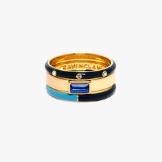 three stack rings with blue and yellow enamel inlays on each one, the ring is