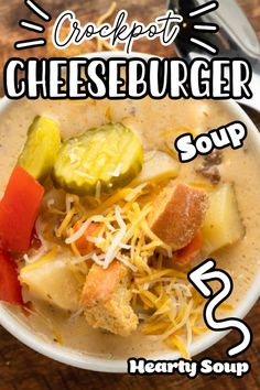 a bowl of cheeseburger soup on a wooden table