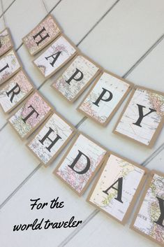 a happy birthday banner made out of maps