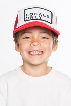 Find your 'Friday Happy' no matter what day it is! A hat to look and feel good in! A comfortable foam front, mesh back, and high crown trucker hat featuring an adjustable snap back. Front: 100% polyester Youth size Back: 100% nylon Front panel with lining Made locally in Newport Beach, CA Willow is 8 years old and Campbell is 6 years old. Locals Only, Snap Back, Newport Beach, Snap Backs, Newport, Trucker Hat, Feel Good, To Look, Matter