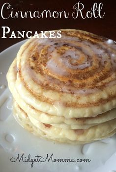 cinnamon roll pancakes on a white plate with text overlay that reads, cinnamon roll pancakes