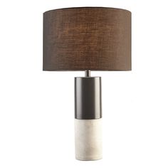 a table lamp with a brown shade on the base and a black drum light in front of it