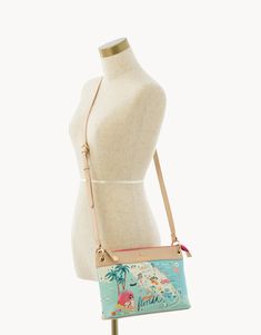 From weekends to weekdays, the Greetings From Crossbody is crafted for fun, ease and comfort. An adjustable faux leather crossbody strap is fastened securely with golden hardware to a coated, textured vinyl exterior. A golden Spartina logo adorns the front side. The top zips closed and there is a handy back exterior zip pocket. Inside there are two slip and one zip pocket housed in a canvas lining. Travel Crossbody Satchel With Adjustable Strap, Travel Crossbody Bag With Adjustable Strap, Vacation Crossbody Satchel With Removable Pouch, Spring Travel Crossbody Shoulder Bag, Summer Crossbody Satchel For On-the-go, Spring Travel Bag With Adjustable Strap, Spring Crossbody Satchel With Adjustable Strap, Spring Travel Shoulder Bag With Detachable Strap, Spring Travel Crossbody Satchel