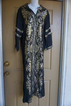 "Vintage gold embroidered Dress. Made in Greece. No size labeled - estimated medium - see measurements. In good vintage condition. Measurements taken across front laid flat Bust: 21\" Waist: 21 \" hip: 21\" Length (shoulder to hem): 53\" Condition: Good" Gold Long Sleeve Ceremonial Dress, Long Gold Dress For Festivals, Gold Long Dress For Festivals, Long Bohemian Gold Dress, Traditional Gold Festival Dress, Traditional Gold Dress For Festival, Long Gold Dresses For Festivals, Greece Dress, Gold Embroidered Dress