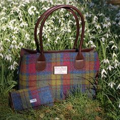 Model: LB1003_MULTI COLOUR TARTAN Harris Tweed Wool Outer Size: 16 x 9.5 inches Ladies Harris Tweed Classic Handbag Designed with two fixed handles, two main compartments with snap closures and one main zipped compartment with a small zipped pocket inside GLEN APPIN Ladies Harris Tweed Classic Handbag. Accessorize in style with this beautiful Harris Tweed handbag. Designed with two fixed handles, two main compartments with snap closures and one main zipped compartment with a small zipped pocket Macleod Tartan, Tweed Handbag, Tartan Tie, Tweed Bag, Black Watch Tartan, Outer Hebrides, Purse Gift, Cute Handbags, Classic Handbags