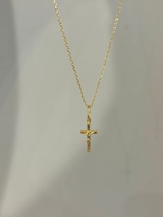 Our cross necklace is a classic, simple and elegant - perfect for everyday wear! Information: ✨ Sterling Silver (925 stamped) | 14K Gold Plated ✨ Adjustable length: 16" - 18" ✨ Hypoallergenic ✨ Tarnish resistant ✨ Water friendly Our cross necklace is highly polished, featuring an splendid level of craftsmanship and attention to detail. On the charm, you can see the image of Jesus on the cross. The charm is dainty and comfortable to wear. Plus, the necklace is adjustable. You have the ability to Cute Cross Necklace Gold, Minimalist Cross Pendant Necklace For First Communion, Classic Cross Clavicle Chain Necklace, Minimalist Cross Pendant Necklaces For Baptism, Classic Cross Pendant Necklace As Gift, Minimalist Cross Pendant Necklace For Baptism, Classic Cross Necklace For Baptism, Elegant Cross Necklace For Confirmation, Silver Cross Necklace For Confirmation