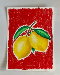 a drawing of two lemons on a red background