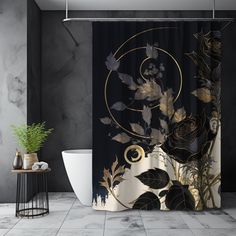 a black and gold shower curtain with leaves on it in a bathroom next to a toilet