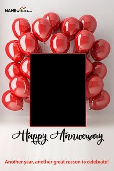 a white box surrounded by red balloons in front of a wall with an empty sign